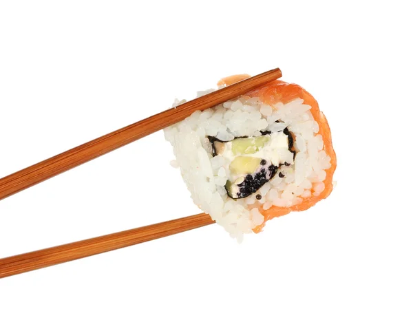 Holding rulo ile üzerine beyaz izole chopsticks — Stok fotoğraf