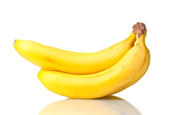 Egy rakás banán elszigetelve a fehéren. — Stock Fotó