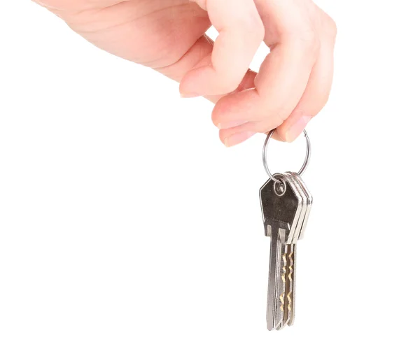 Κλειδιά στο χέρι που απομονώνονται σε λευκό — Φωτογραφία Αρχείου