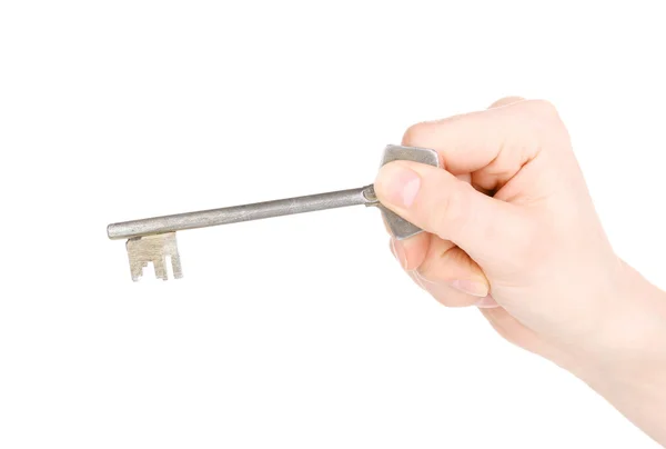 Κλειδί στο χέρι που απομονώνονται σε λευκό — Φωτογραφία Αρχείου