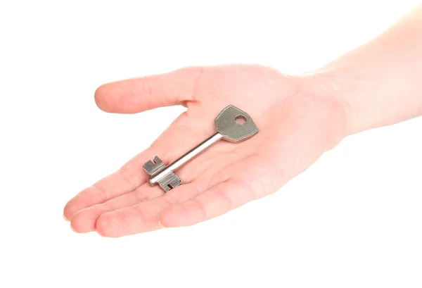 Nyckel i hand isolerad på vit — Stockfoto