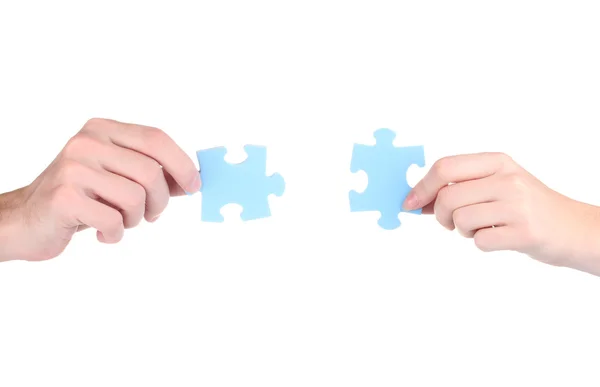Ruce a puzzle, izolované na bílém — Stock fotografie