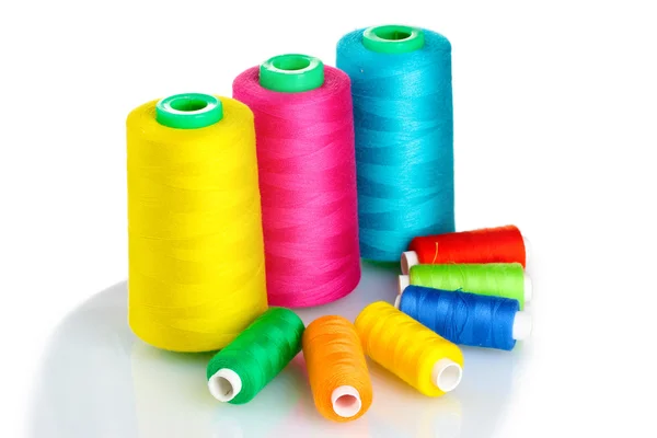 Many-coloured bobbins of thread isolated on white — Stock Photo, Image