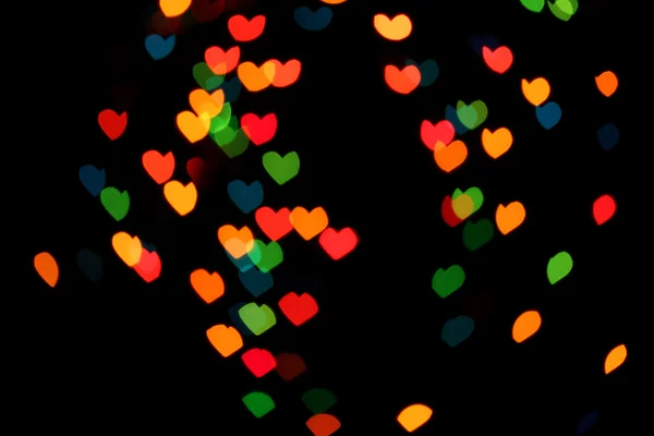 Abstract bright hearts bokeh background — Stock Photo, Image