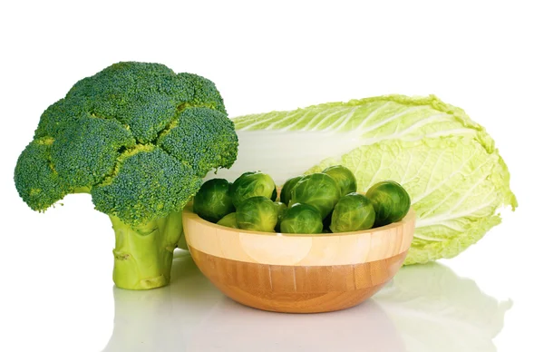 Brussels sprouts in wooden bowl with broccoli and cabbage isolated on white — Stock Photo, Image