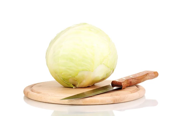Green cabbage on wooden chopping board isolated on white — Stock Photo, Image