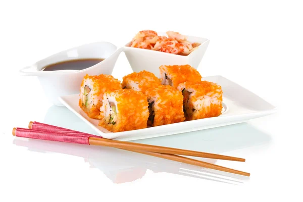 Delicious sushi on plate, chopsticks, soy sauce and shrimps isolated on wh — Stock Photo, Image