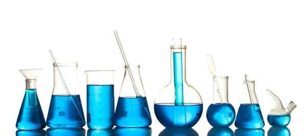 Тестові труби з синьою рідиною ізольовані на білому — стокове фото