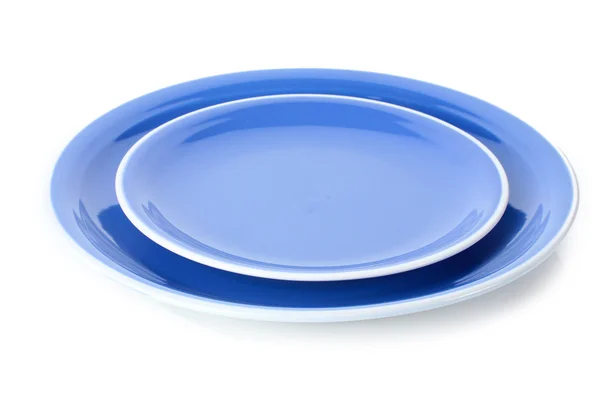 Niebieski puste talerze na białym tle — Zdjęcie stockowe