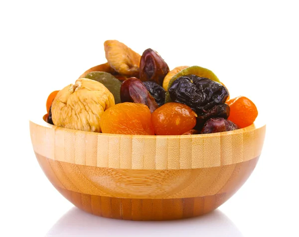 Dried fruits in wooden bowl isolated on white — Stock Photo, Image