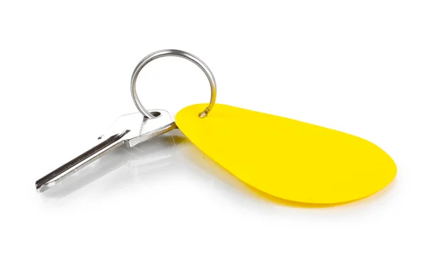 Key with charm isolated on white — Stock Photo, Image