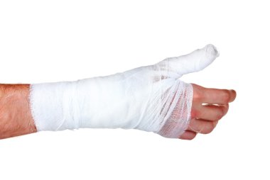 Bandaged hand isolated on white clipart