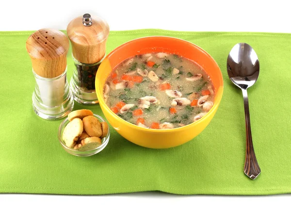 Tasty soup on green tablecloth — Stock Photo, Image