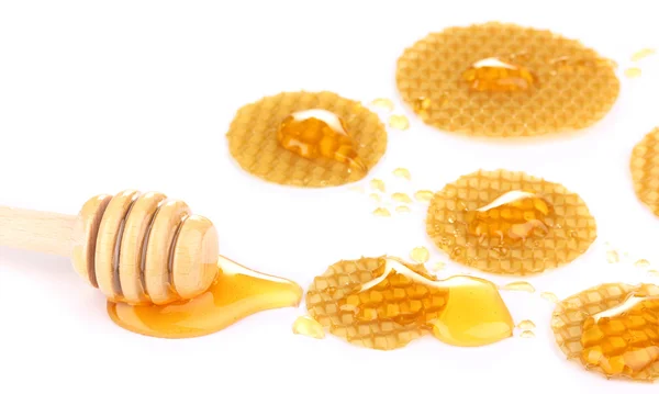 Panal y miel aislados en blanco —  Fotos de Stock
