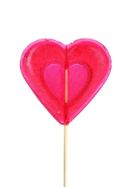 Red heart-lollipop isolated on white Royalty Free Stock Images