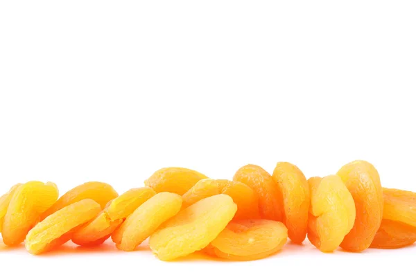 Delicious dried apricots isolated on white — Stock Photo, Image