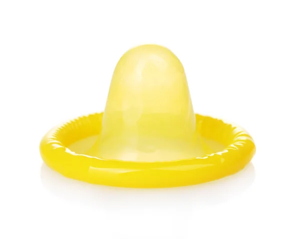 Yellow condom isolated on white — Stock Photo, Image