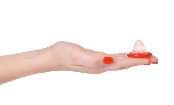 Mano sosteniendo un condón aislado en blanco —  Fotos de Stock