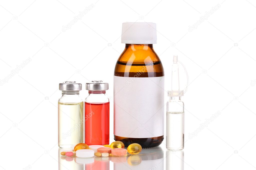 Medical bottles with tablets and ampoules isolated on white