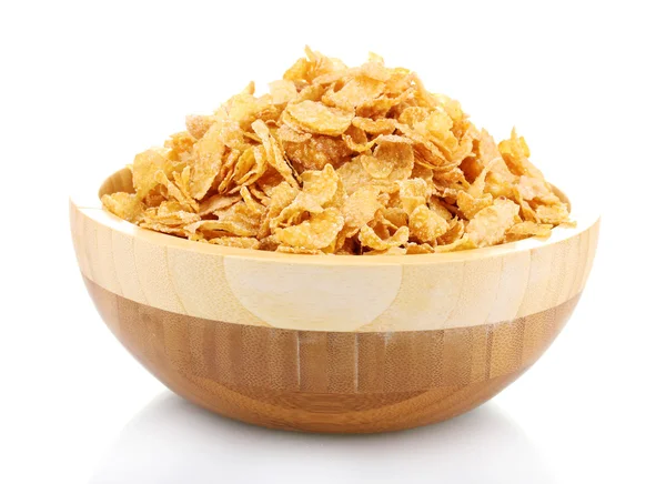 Tasty cornflakes in wooden bowl isolated on white — Stock Photo, Image