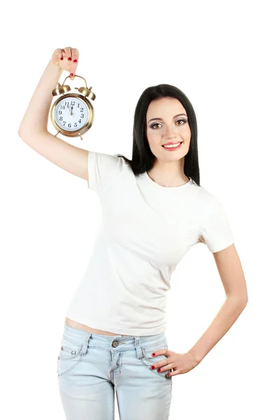 सुंदर युवा लड़की सफेद पर अलग अलार्म घड़ी पकड़े हुए — स्टॉक फ़ोटो, इमेज