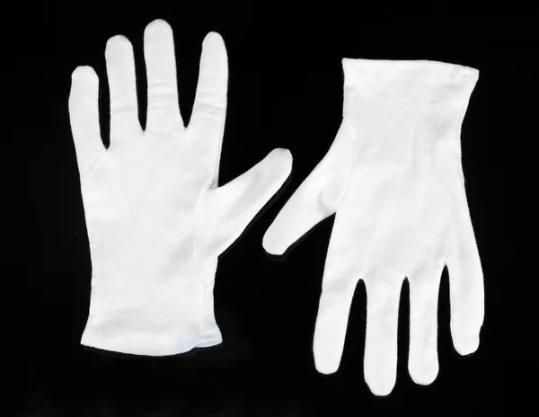 Rękawice tkaniny na czarnym tle — Zdjęcie stockowe