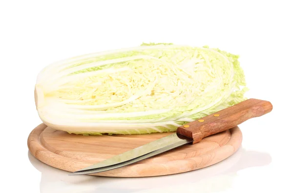 Green cabbage on wooden chopping board isolated on white — Stock Photo, Image