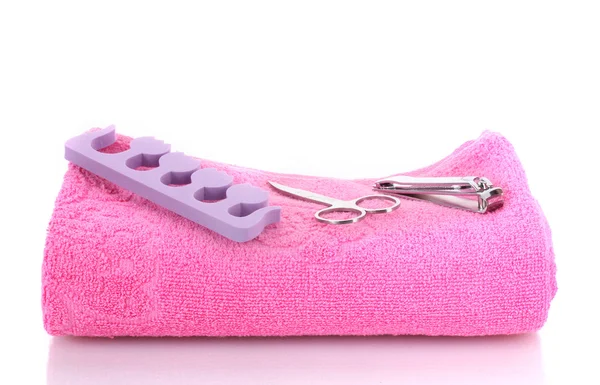 Set pedicure su asciugamano rosa isolato su bianco — Foto Stock