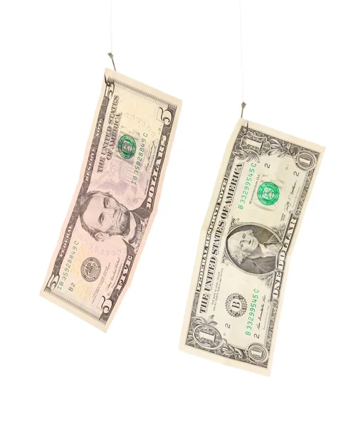 Dollars on fishing hooks isolated on white — Stock Photo, Image
