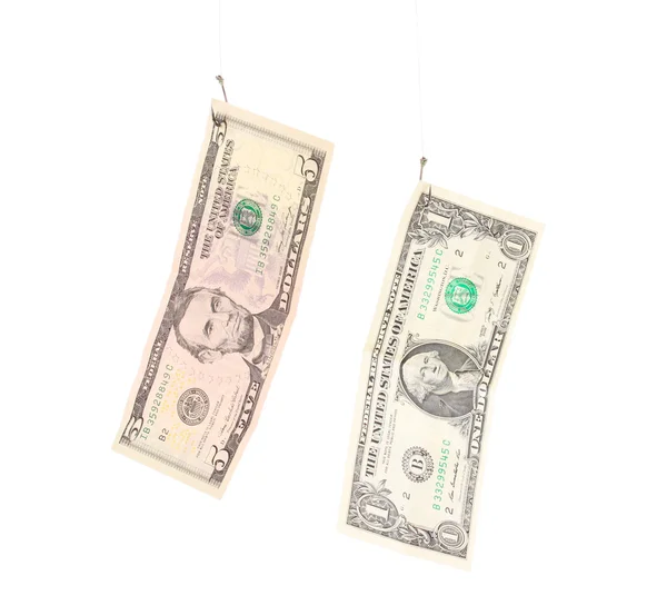 Dollars on fishing hooks isolated on white — Stock Photo, Image