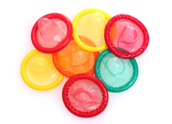 Colorful condoms isolated on white — Stock Photo, Image