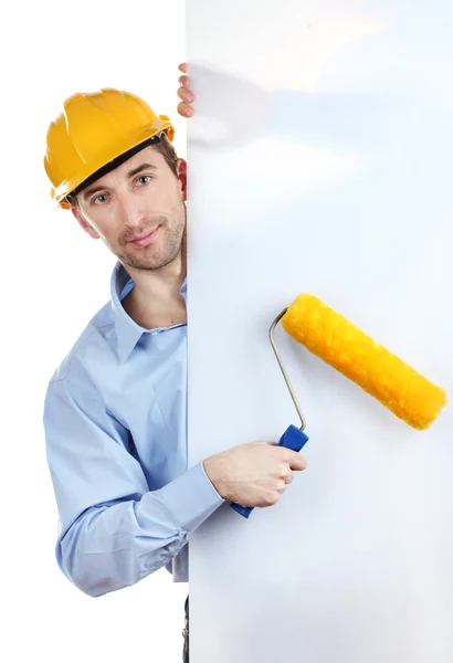 Young man with helmet and roller isolated on white — Stock Photo, Image