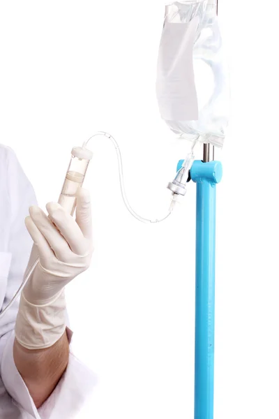 Nurse doing infusion isolated on white — Stock Photo, Image