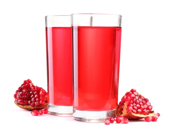Ripe pomergranate and glasses of juice isolated on white — Stock Photo, Image
