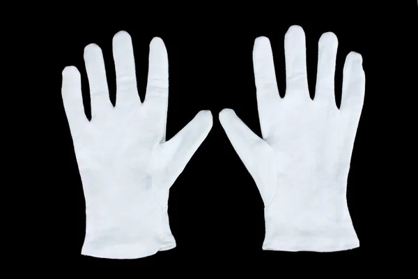 黒の背景に布製の手袋 — ストック写真