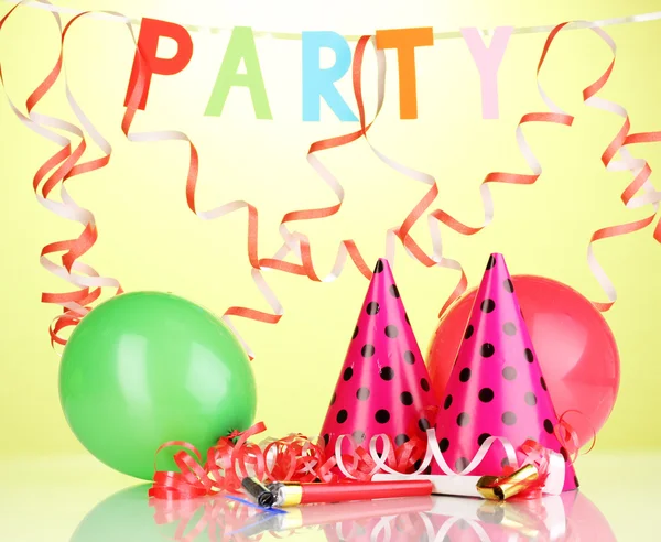 Party items on green background — Stock Photo, Image