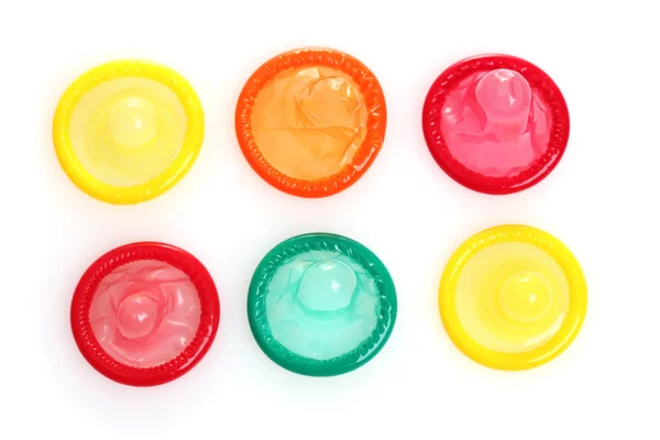 Preservativos coloridos aislados en blanco —  Fotos de Stock