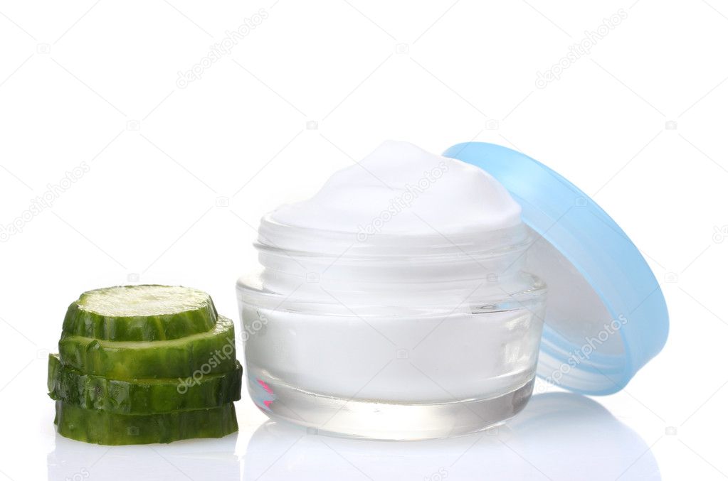 Cream and fresh sliced cucumber isolated on white