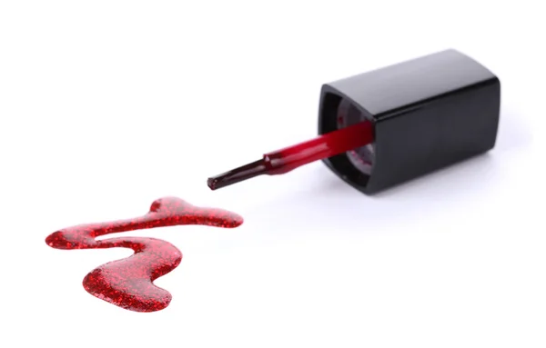 Červený lak na nehty a štětec izolovaných na bílém — Stock fotografie