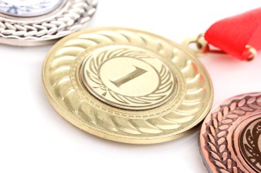 Three medals close-up isolated on white clipart