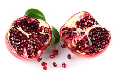 Ripe pomegranate fruit with leaves isolated on white clipart