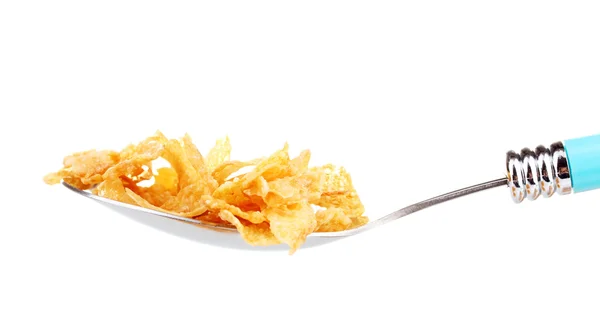 Leckere Cornflakes im Löffel isoliert auf weiß — Stockfoto