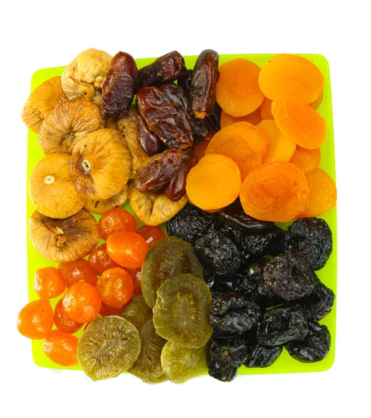 Delicious dried fruits on plate isolated on white — Stock Photo, Image