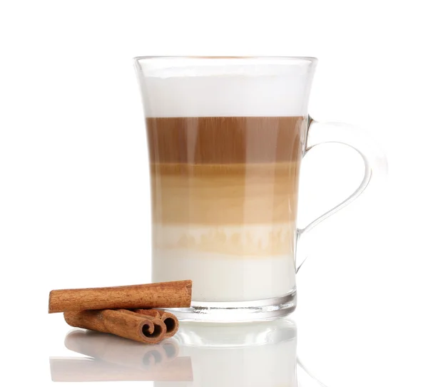 Fragrant сappuccino latte in glass cup and cinnamon isolated on white — Stock Photo, Image