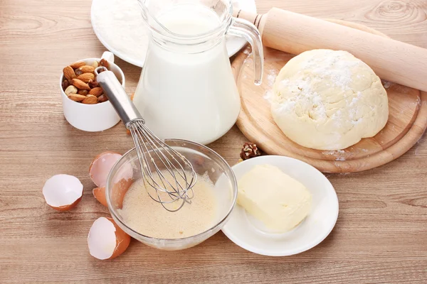 Ingredients for the dough wooden table — Stock Photo, Image