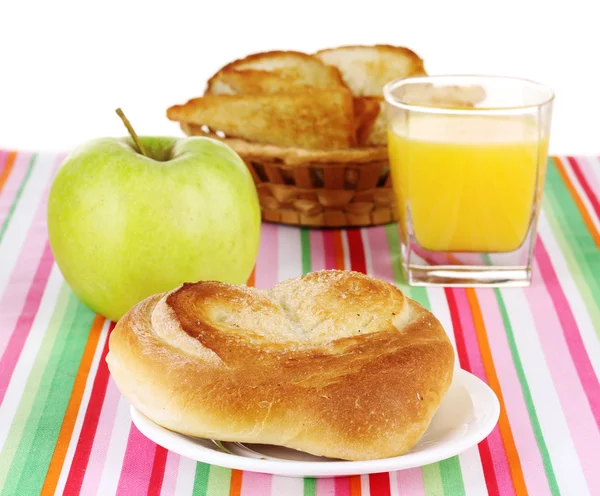 Classical breakfast. Orange juice and bun — Stock Photo, Image