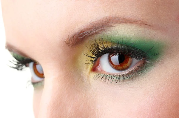 Schöne weibliche Augen mit hellem Make-up Stockbild