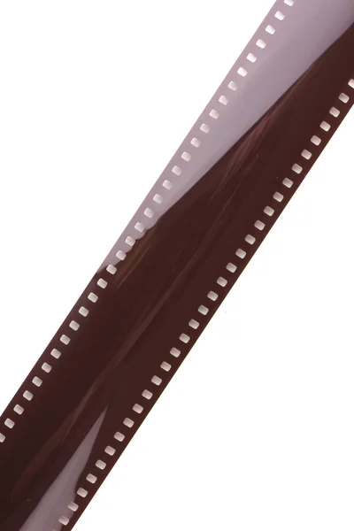 Película fotográfica aislada en blanco Imagen de stock