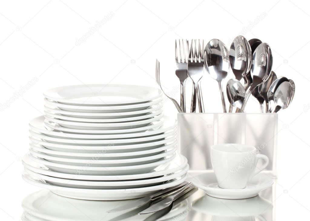 Clean plates and cutlery isolated on white