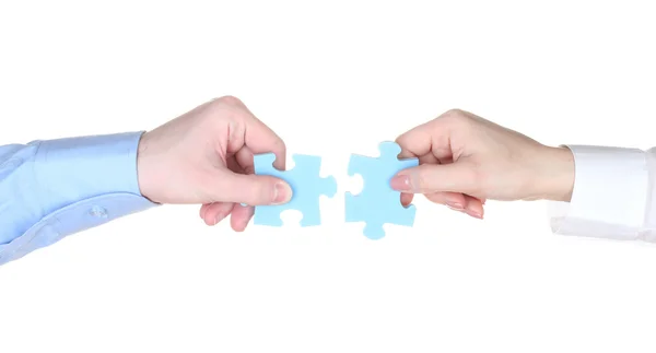 Stock image Hands with puzzle isolated on white